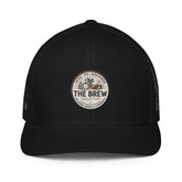 The Brew Collective trucker cap featuring a stylish logo for coffee lovers.