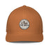The Brew Collective trucker cap in orange with logo showcasing coffee and brewing accessories.