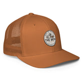 The Brew Collective trucker cap in gray with mesh back and round logo design for coffee enthusiasts.
