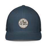 The Brew Collective trucker cap in navy blue with a logo, perfect for coffee lovers and casual wear.