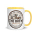 The Brew Collective mug with color inside showcasing a vibrant yellow interior, perfect for coffee and tea.